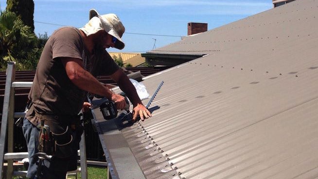 gutter installation on a roof - gutters Toowoomba