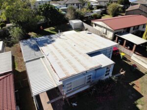 Residential Roof Showing Early Damage Signs